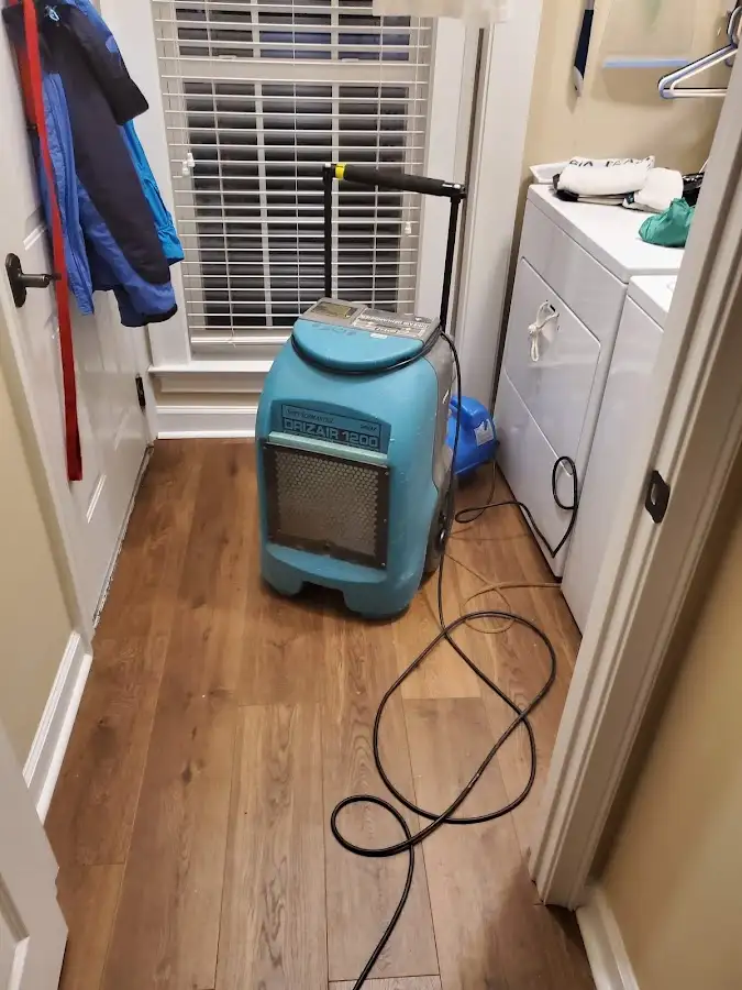 Commercial dehumidifier deployed for Flood Damage Cleanup in Willowbrook